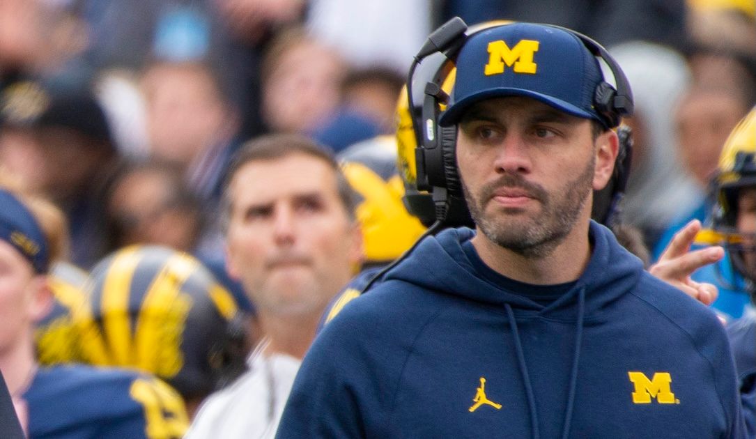 Former Michigan football coach indicted in hacks of athlete databases of more than 100 colleges