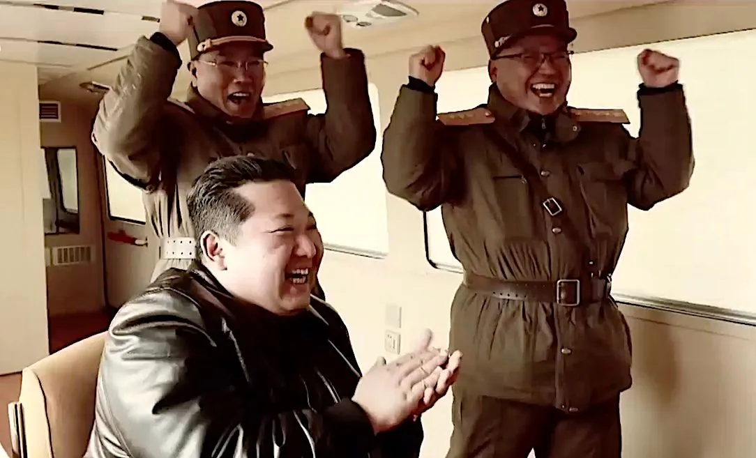 Kim Jong-un and his generals cheer after the apparent launch of the Hwasong-17 long-range missile in March. (IMAGE: Korean Central Television)
