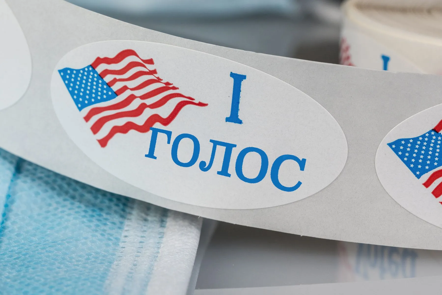 An "I Voted" sticker in Russian.