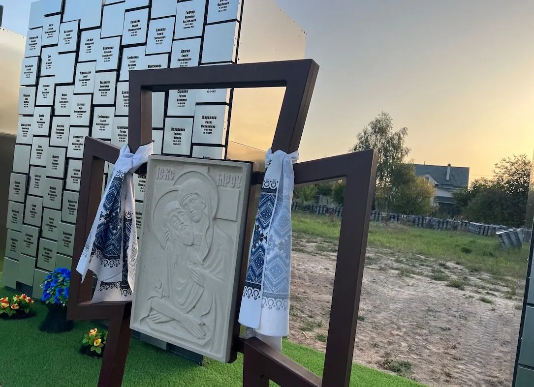 Temporary memorial  at a mass grave near Bucha’s Church of St. Andrew in Ukraine