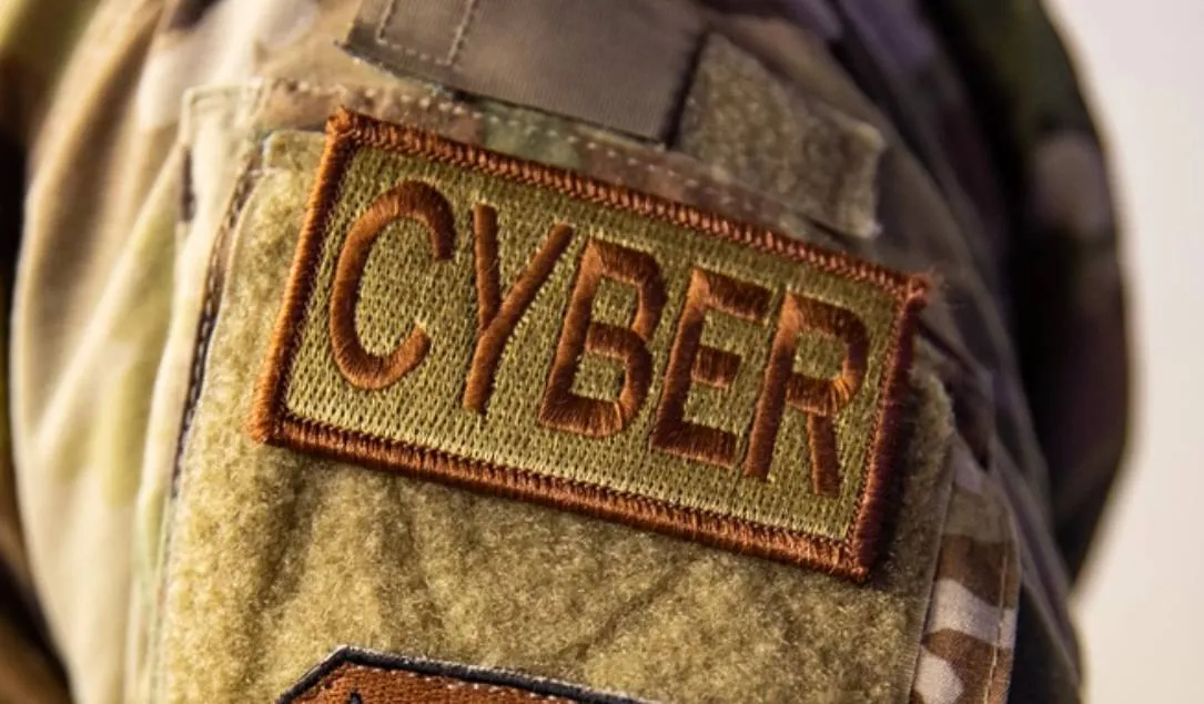 A military officer wearing a cyber patch