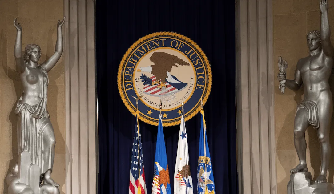Department of Justice seal and flags