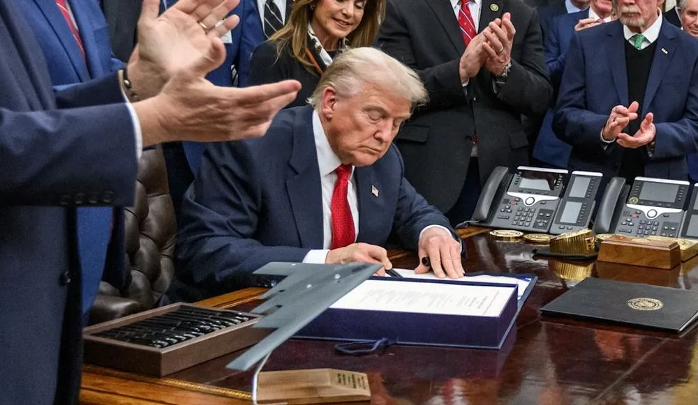 President Donald Trump signs bill to fund government