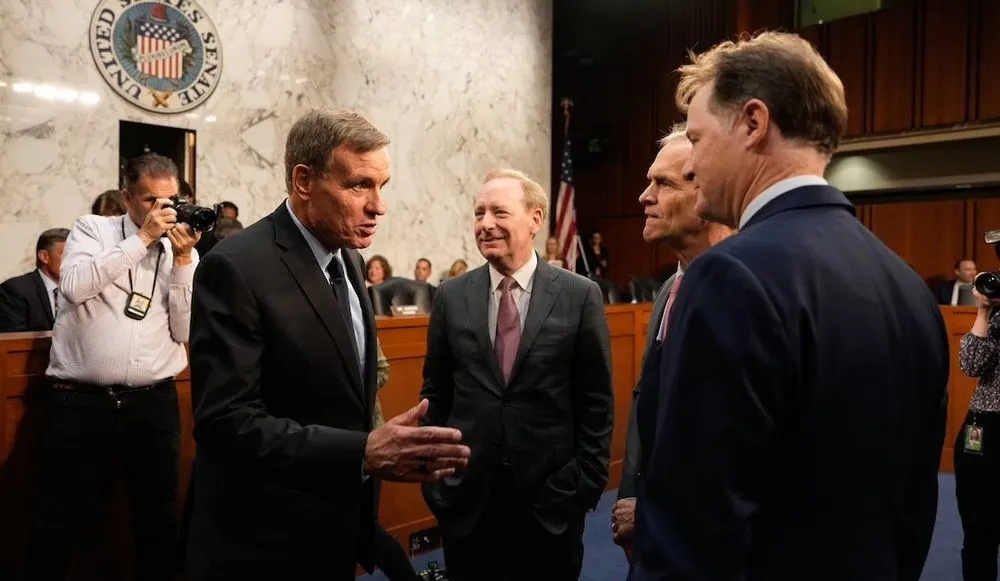 Sen. Mark Warner, Brad Smith, Kent Walker, Nick Clegg