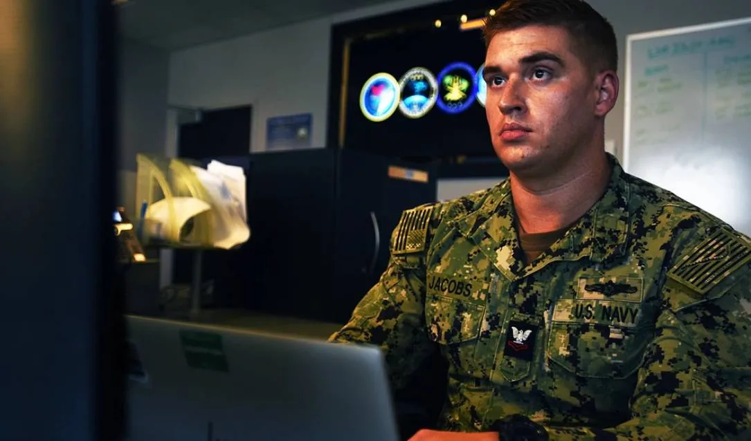A U.S. Navy officer specializing in cybersecurity