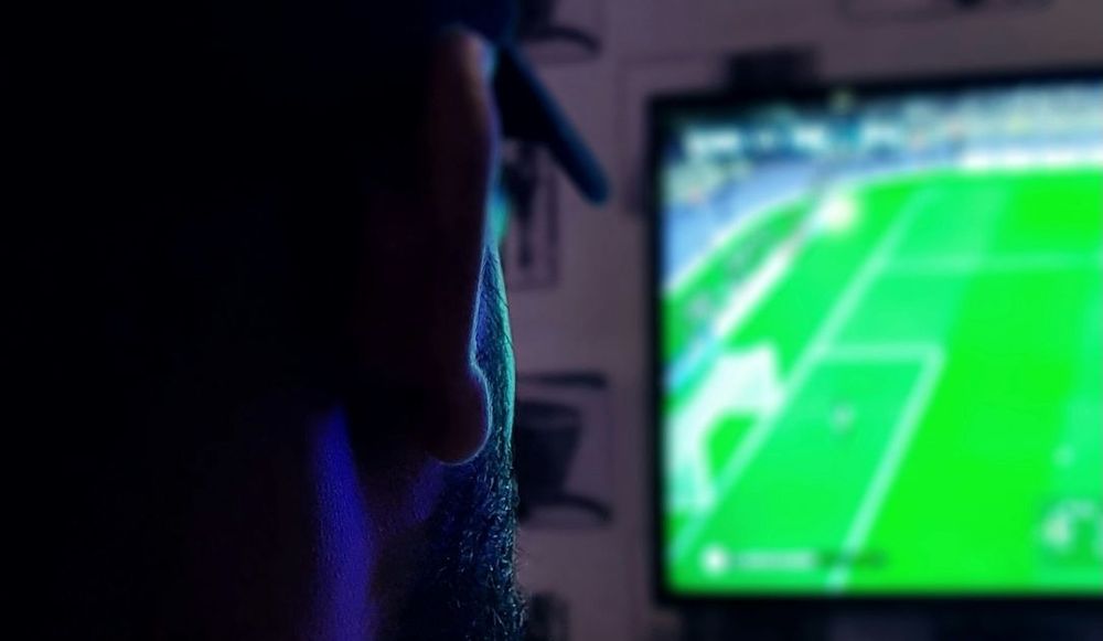 Person viewing a football or soccer match