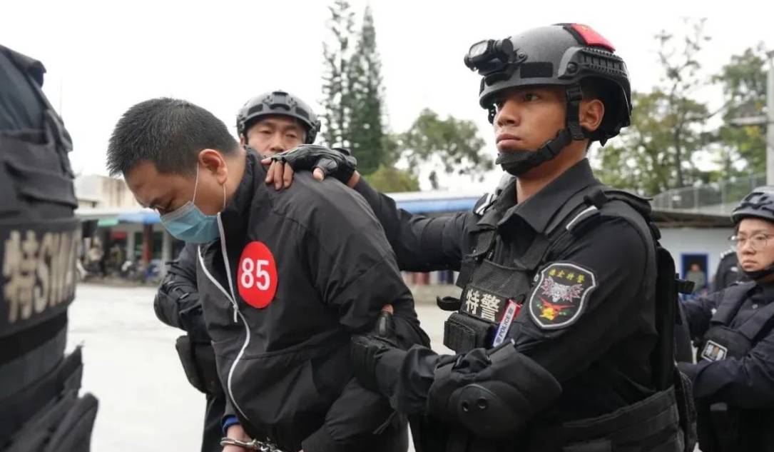 A man being arrested by Chinese law enforcement