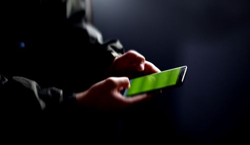 person holding mobile phone