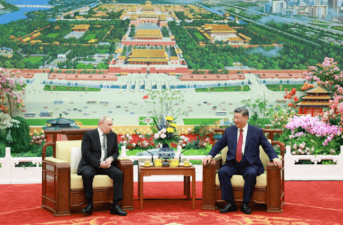 Putin and Xi having tea in Beijing. Pic: China MFA